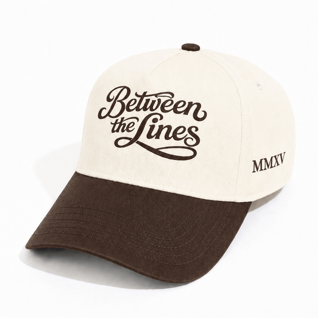 Front view of BTL Cursive MMXV A-Frame Snapback with script logo and brown brim.