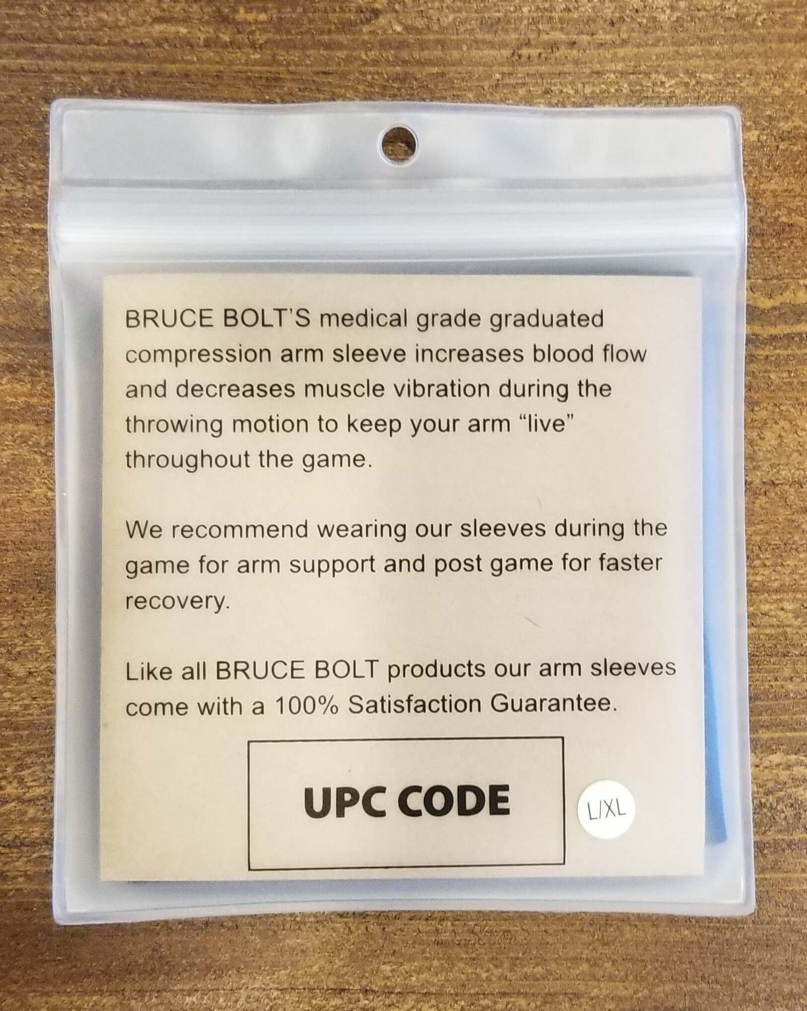 Bruce Bolt graduated compression arm sleeve packaging detailing benefits for increased blood flow and faster recovery.