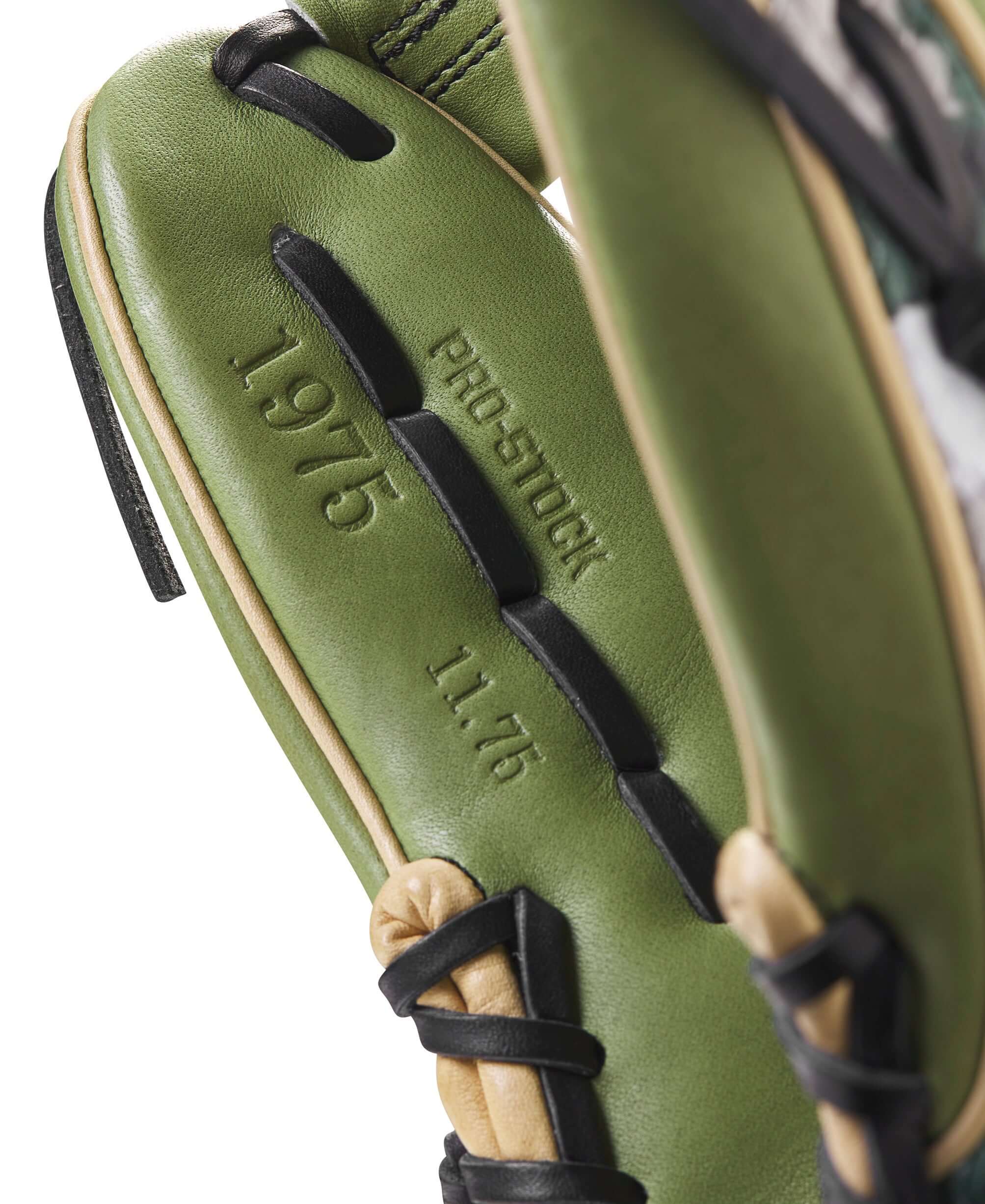 Close-up of the Wilson A2000 GOTM November 2023 glove showcasing Olive Green Pro Stock leather and model details.