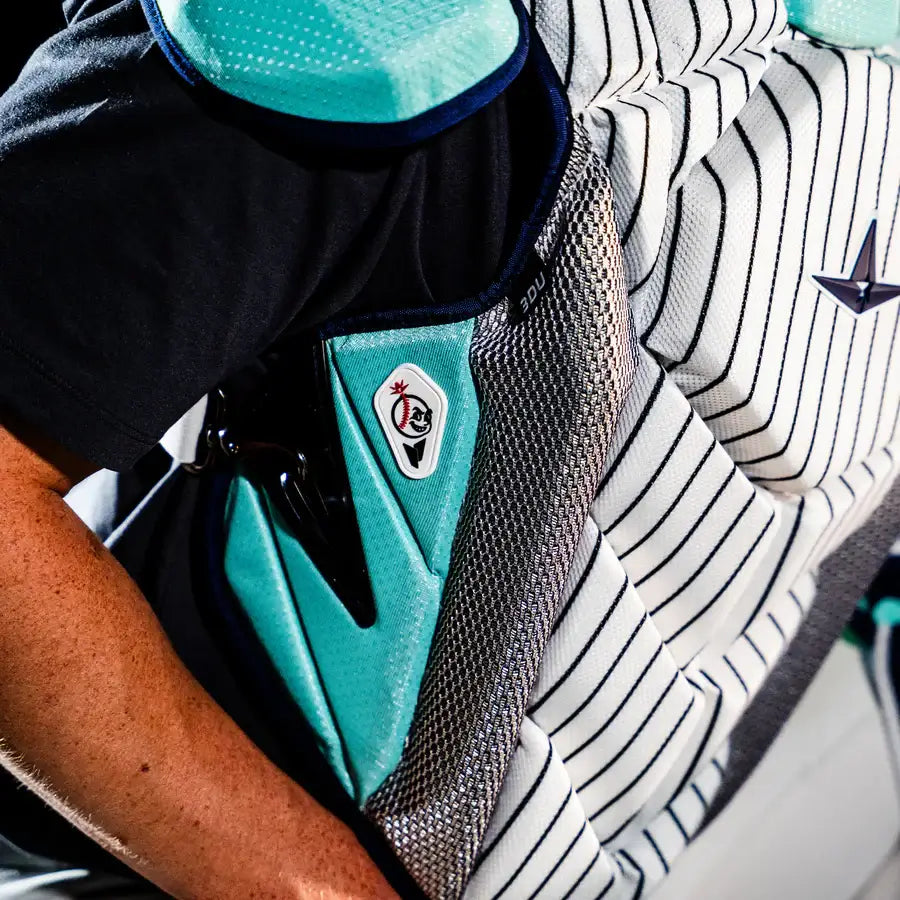 Close-up of All-Star MVP-Pro Short Fuse Catcher's Kit chest protector, New York Limited Edition, Pinstripe design, shoulder padding visible.