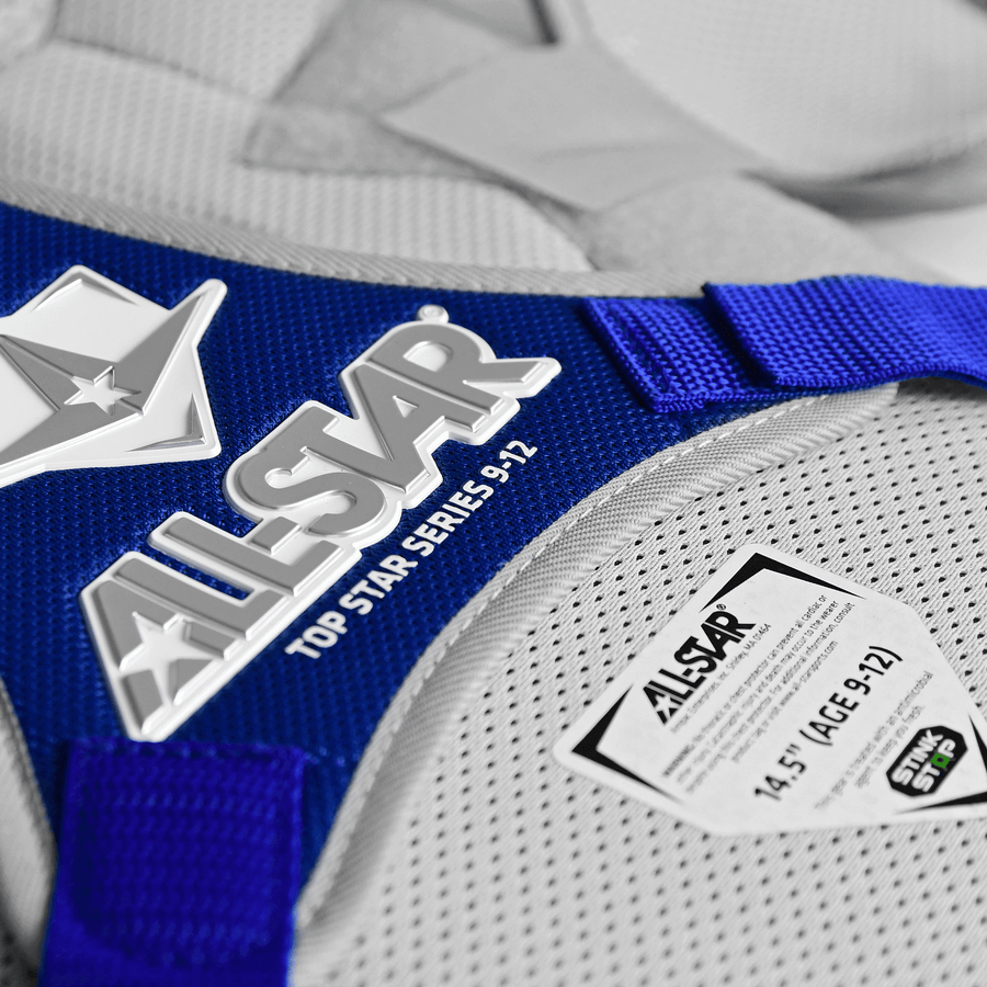 Close-up of All-Star Top Star Series catcher gear for ages 9-12, featuring logo and adjustable straps.