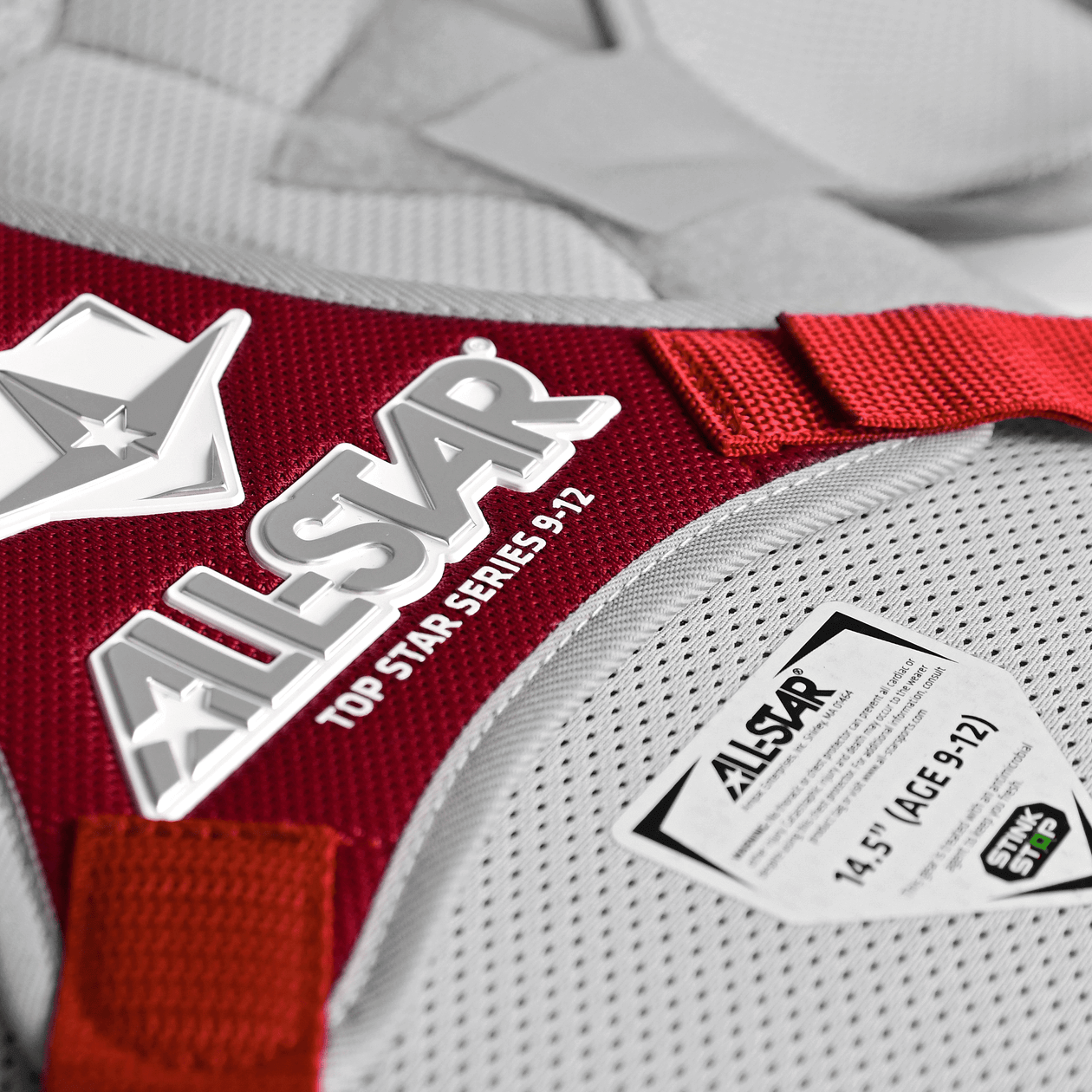All-Star Top Star Catcher's Kit label with red accents, showcasing NOCSAE age 9-12 specifications and mesh fabric details.