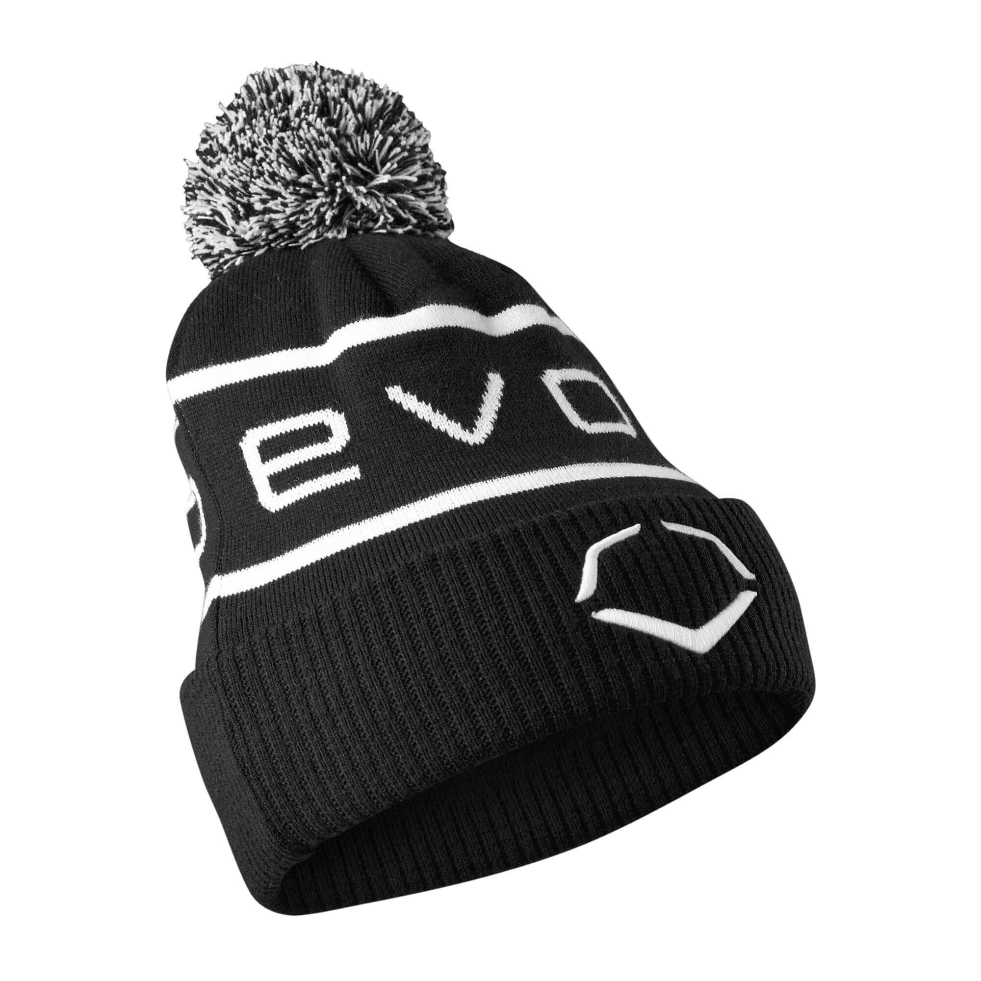 Black Evoshield Pom Pom Beanie with white logo and pom pom, angled side view showing ribbed knit design and embroidered emblem.