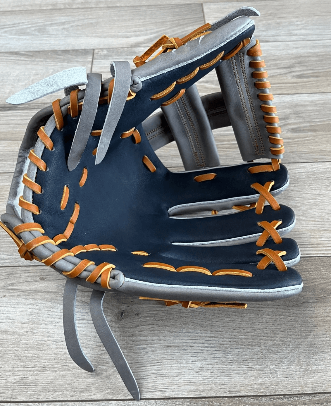 The Glove Lab 11.5" Single Post glove in grey and navy, featuring Japanese tanned US Steerhide construction.