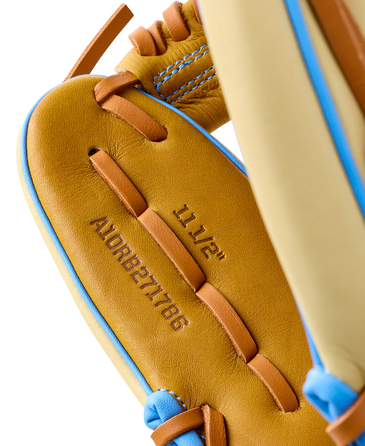 Close-up of Wilson 2027 A1000 1786 Infield Baseball Glove with Saddle Tan, Blonde, and Cool Blue design, showcasing 11.5-inch length detail.
