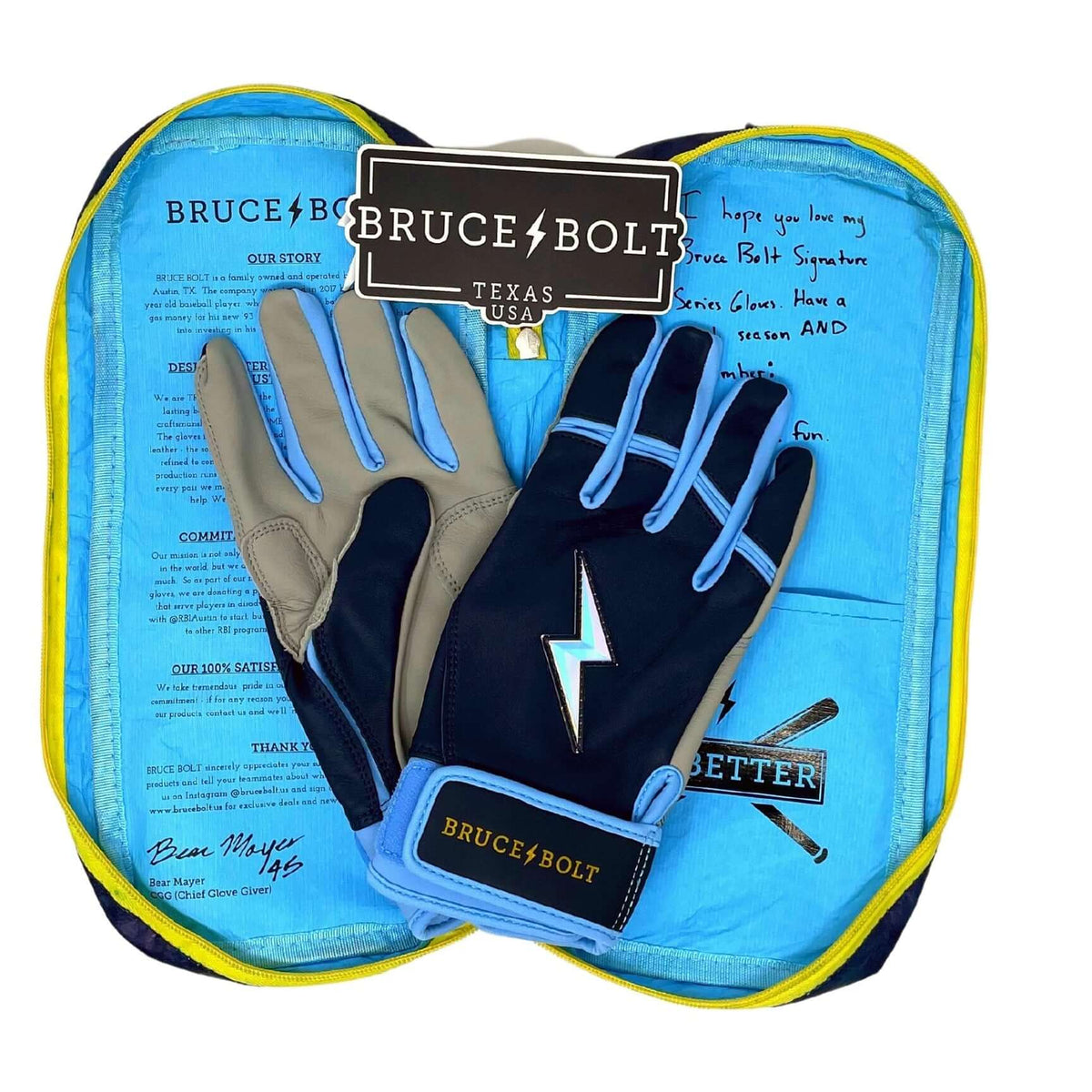 Bruce Bolt Premium Pro Phillips Series Short Cuff Batting Gloves in navy and light blue with yellow accents, packaged with a cool bag.