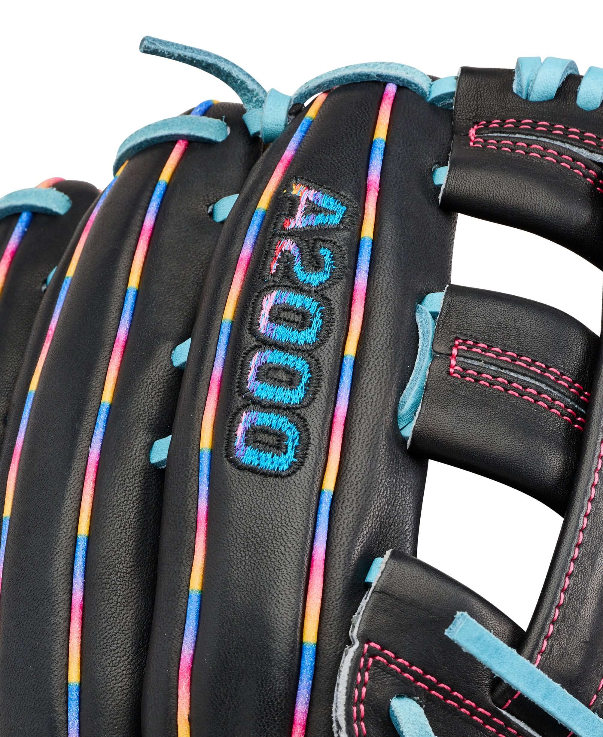 Wilson 2026 Love the Moment 1750 12.5” Outfield Baseball Glove close-up of black leather with rainbow laces and A2000 stitching.