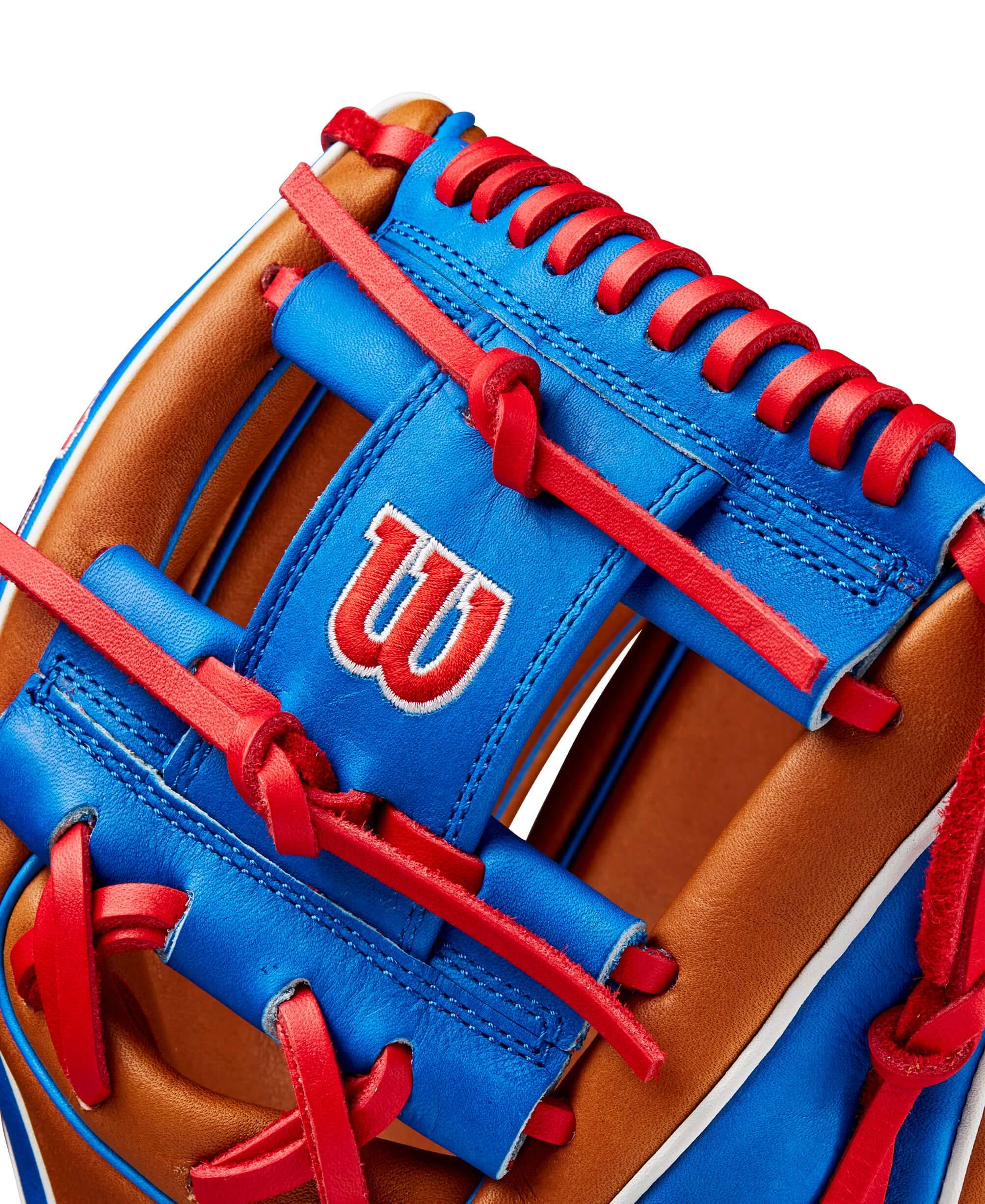 Close-up of Wilson Fall 2024 Mookie Betts A2K 1786 infield baseball glove with blue and saddle tan leather details.
