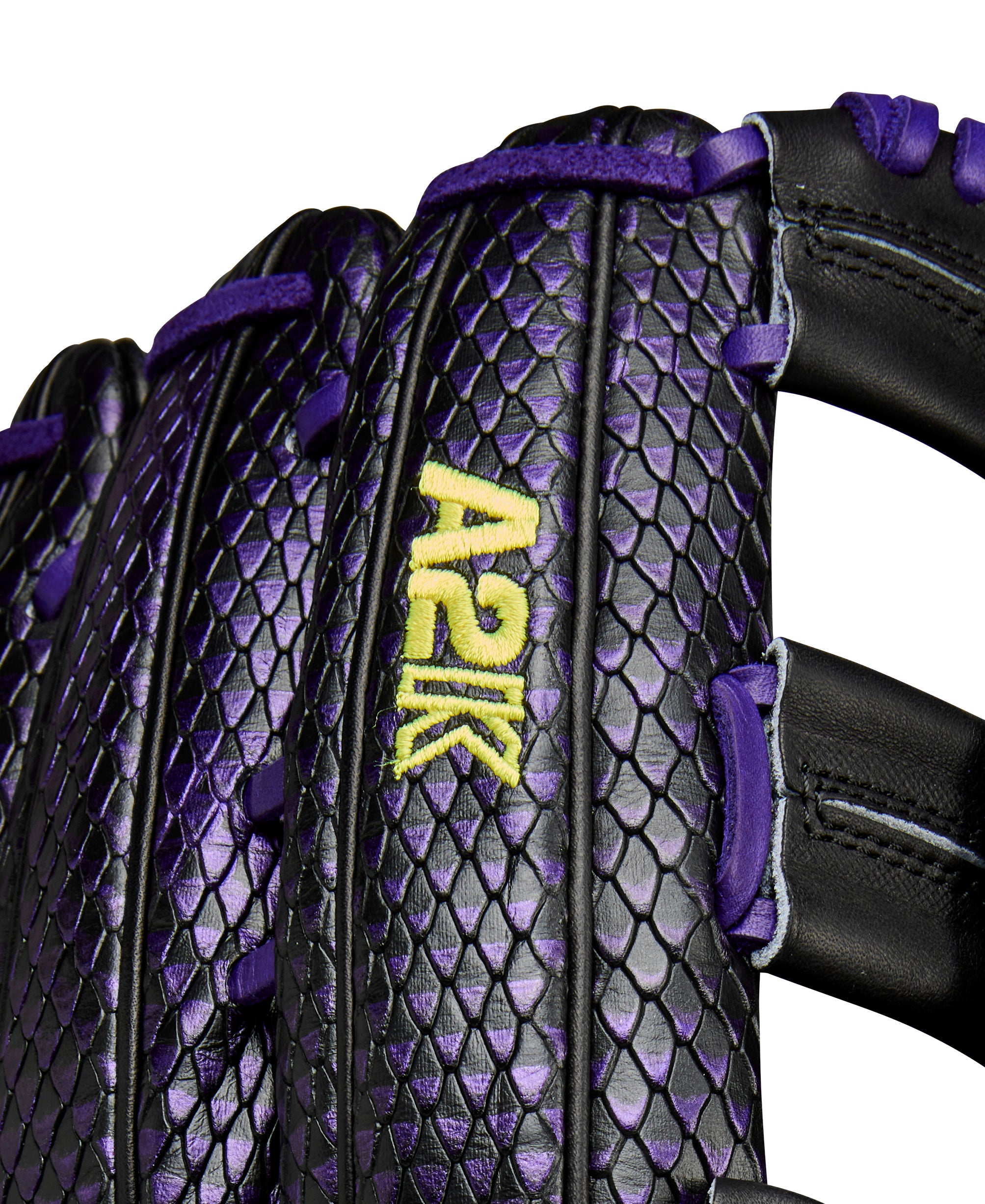 Close-up of A2K logo on fingers with quality craftsmanship on Black leather