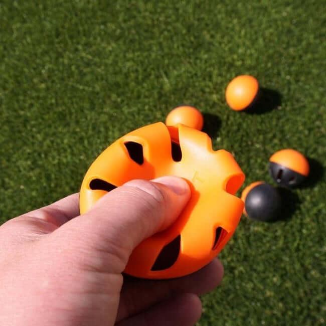 Alt tag for image of Bownet Snap Back Mini Training Balls: Bownet Snap Back Mini Training Balls poly-flex 9-inch collapsible baseballs for training.