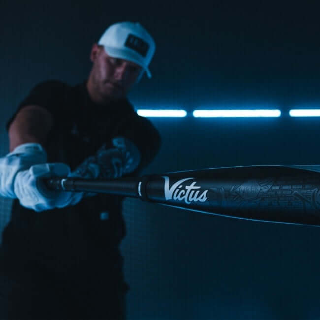 Two-piece hybrid baseball bat with carbon composite handle and military-grade aluminum barrel.