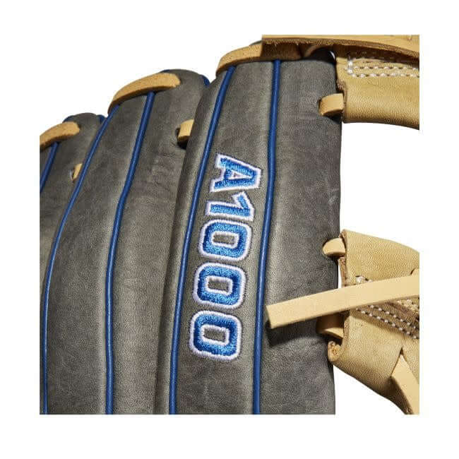Wilson A1000 1787 11.75-inch glove in grey, royal blue, and white with Blonde H-Web for shortstops and third basemen.