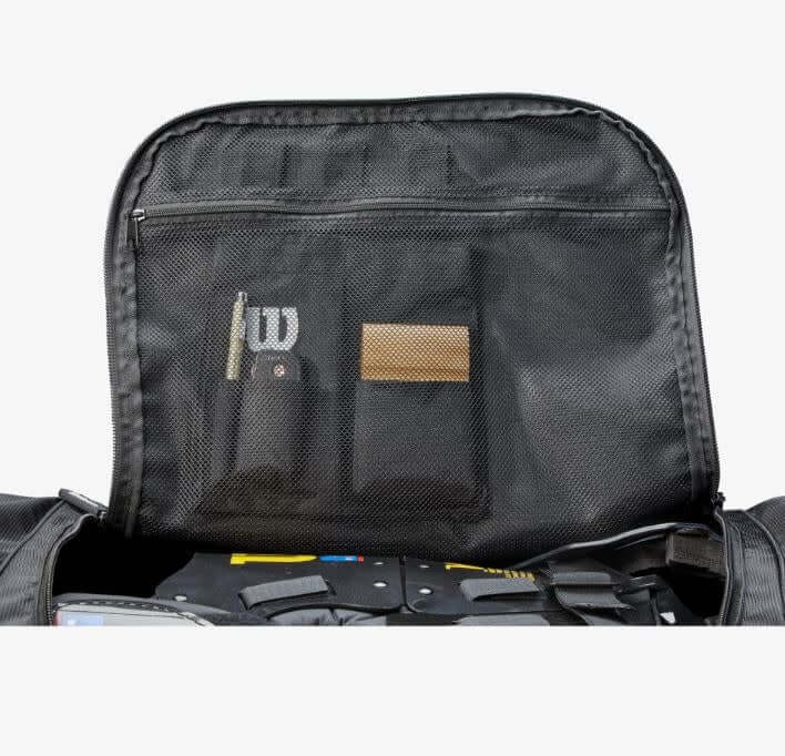 Wilson Umpire Bag On Wheels with comfort-grip handle and inline wheels